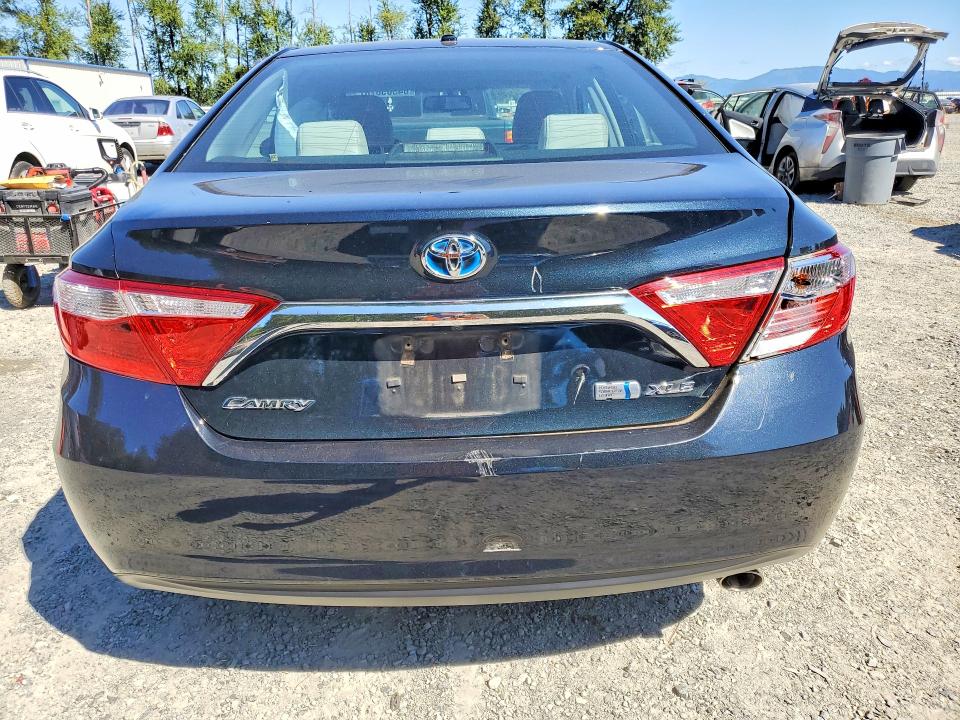 Auction sale of the 2016 Toyota Camry Hybrid, vin: 4T1BD1FK1GU186318, lot number: 64505676