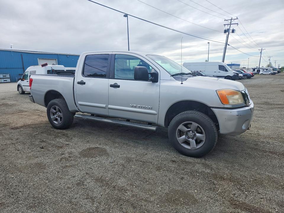 64476076 :رقم المزاد ، 1N6BA0EC5AN314477 vin ، 2010 Nissan Titan مزاد بيع