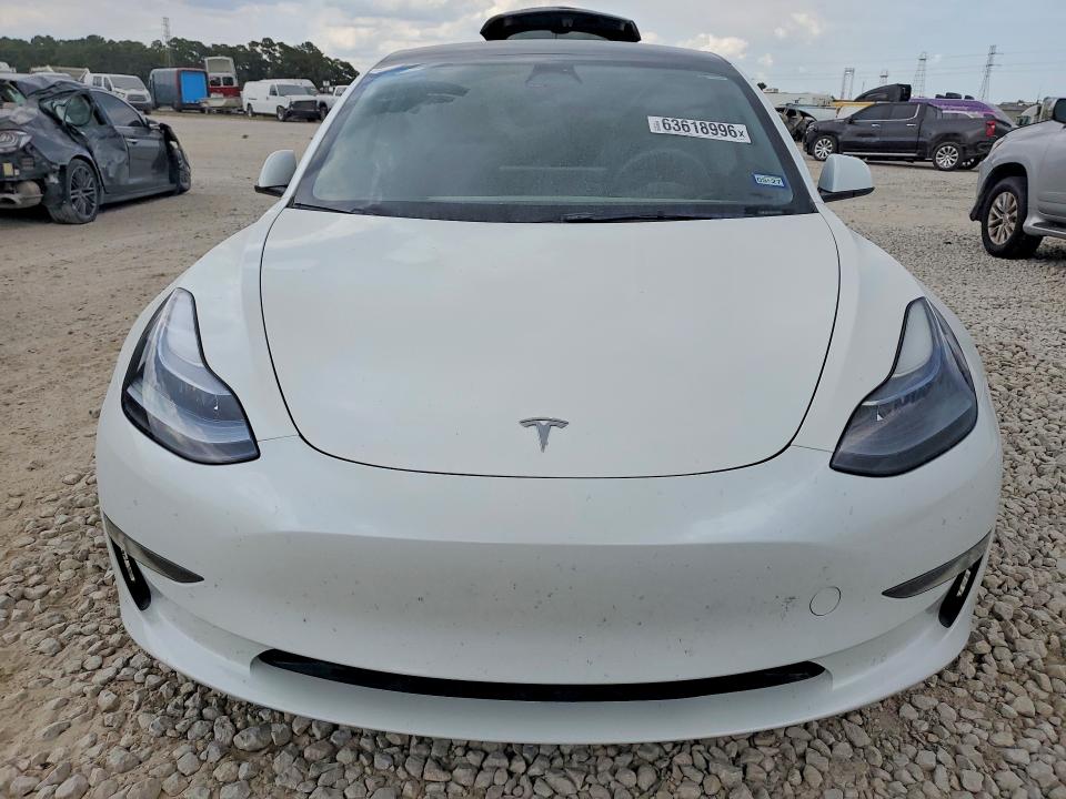 Продажа на аукционе авто 2023 Tesla Model 3, vin: 5YJ3E1EA5PF409712, номер лота: 63618996