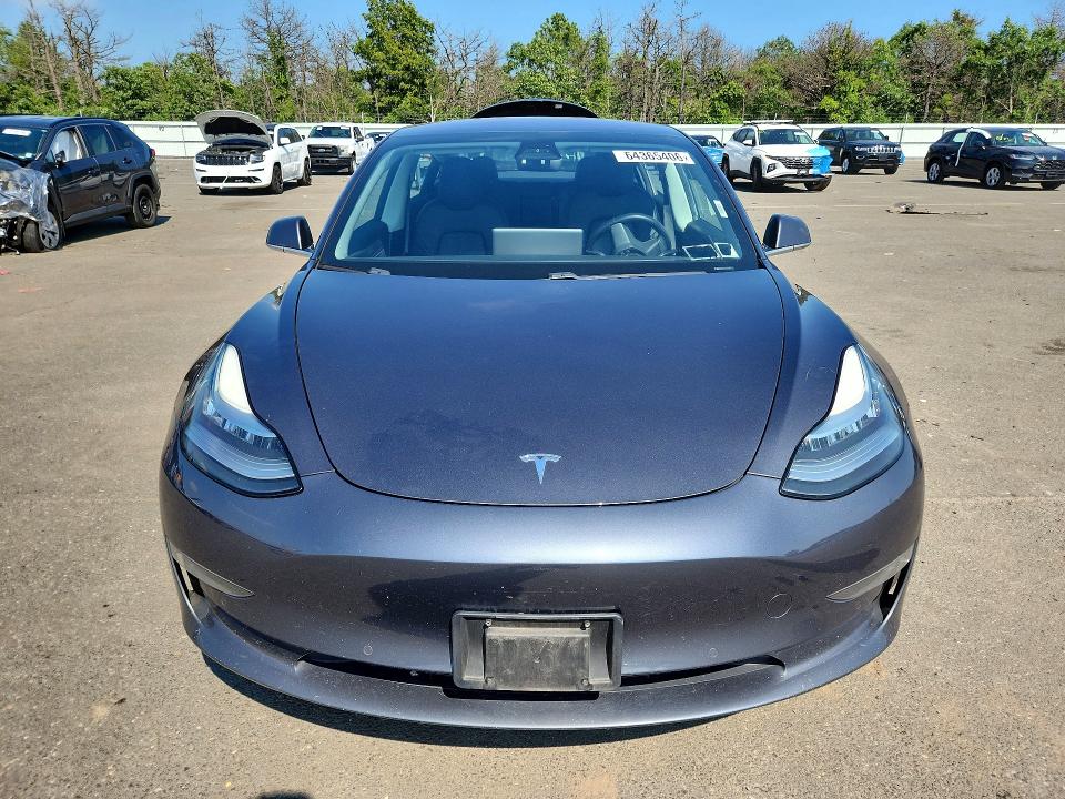 2018 Tesla Model 3 მანქანა იყიდება აუქციონზე, vin: 5YJ3E1EA3JF031087, აუქციონის ნომერი: 64365406