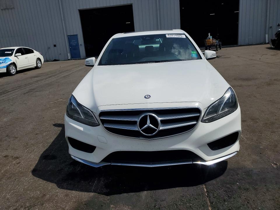 63914926 :رقم المزاد ، WDDHF5KB4EB019195 vin ، 2014 Mercedes-benz E مزاد بيع