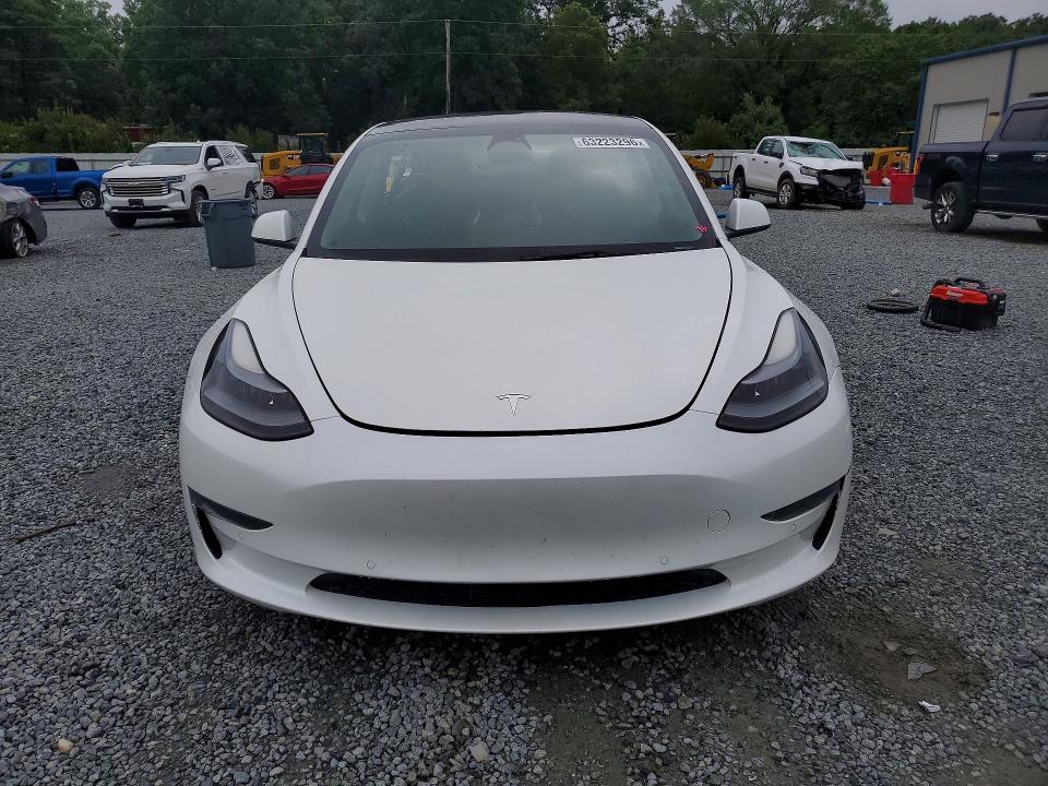Продажа на аукционе авто 2022 Tesla Model 3, vin: 5YJ3E1EA6NF306554, номер лота: 63223296