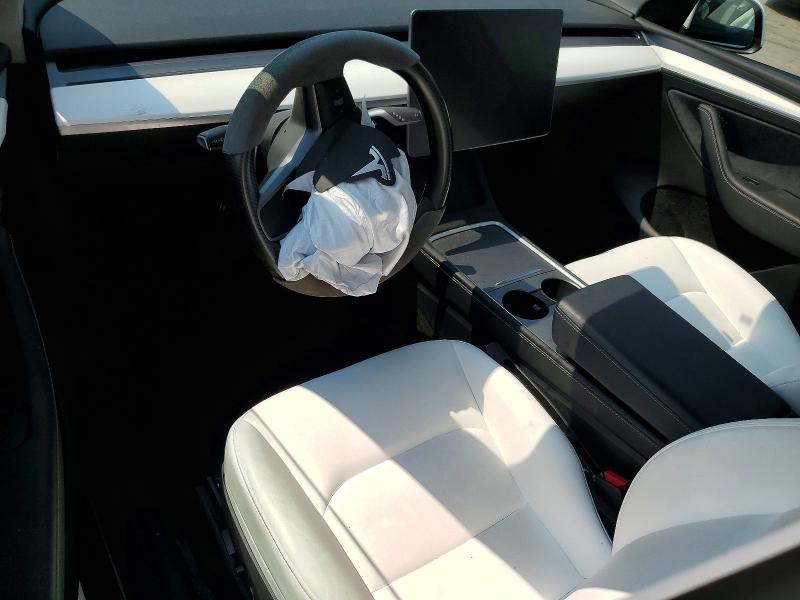 Auction sale of the 2025 Tesla Model Y, vin: 7SAYGAEE7SF288311, lot number: 64292576