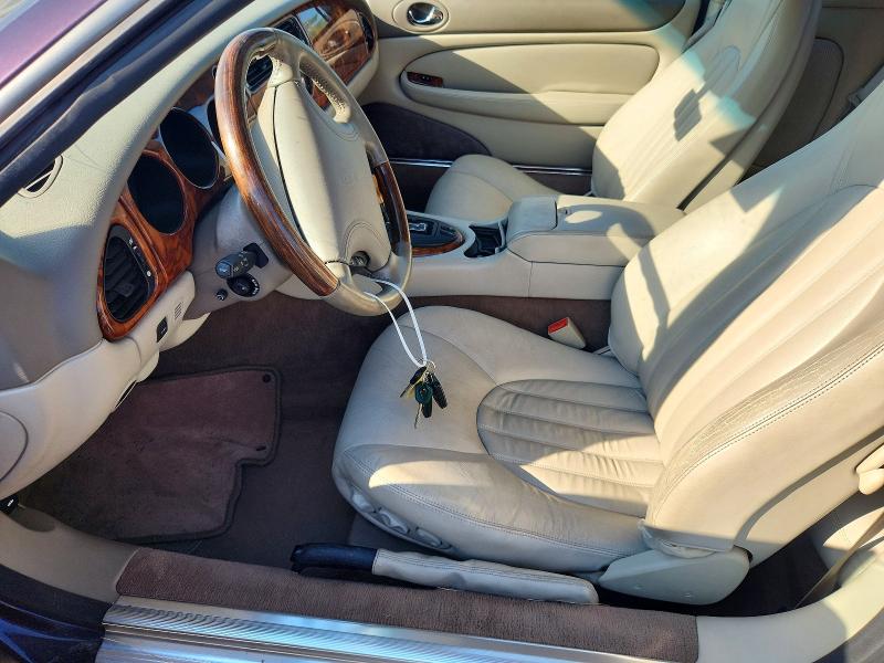 63719366 :رقم المزاد ، SAJGX2043XC033125 vin ، 1999 Jaguar Xk8 مزاد بيع