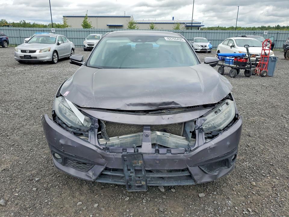 63765456 :رقم المزاد ، 2HGFC1F90JH107660 vin ، 2018 Honda Civic مزاد بيع