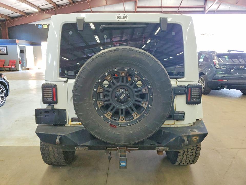 2015 Jeep Wrangler Unlimited მანქანა იყიდება აუქციონზე, vin: 1C4BJWEG4FL736963, აუქციონის ნომერი: 65999786