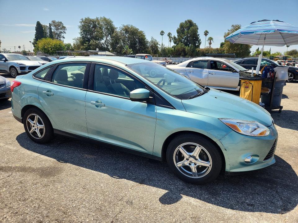 Auction sale of the 2012 Ford Focus, vin: 1FAHP3F2XCL319973, lot number: 64146036