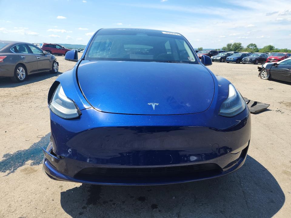 65495256 :رقم المزاد ، 7SAYGDEE2PF663031 vin ، 2023 Tesla Model Y مزاد بيع