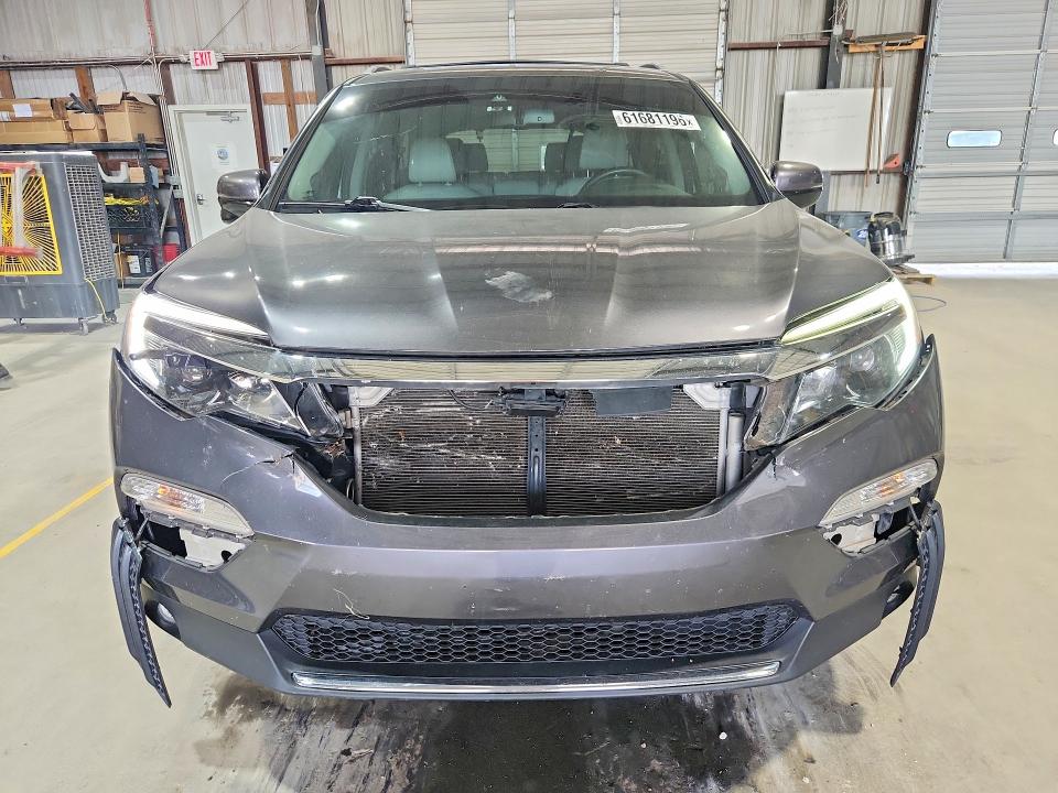 Продажа на аукционе авто 2017 Honda Pilot, vin: 5FNYF6H9XHB104435, номер лота: 61681196