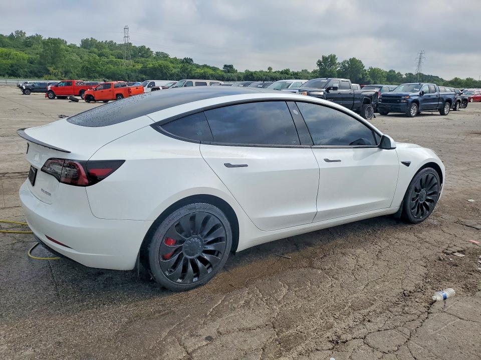 Продажа на аукционе авто 2023 Tesla Model 3, vin: 5YJ3E1EC2PF410530, номер лота: 63875126