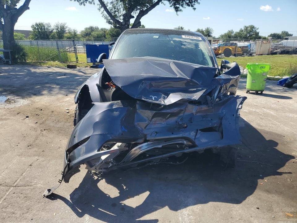 2022 Tesla Model Y მანქანა იყიდება აუქციონზე, vin: 7SAYGDEF2NF451719, აუქციონის ნომერი: 64946786