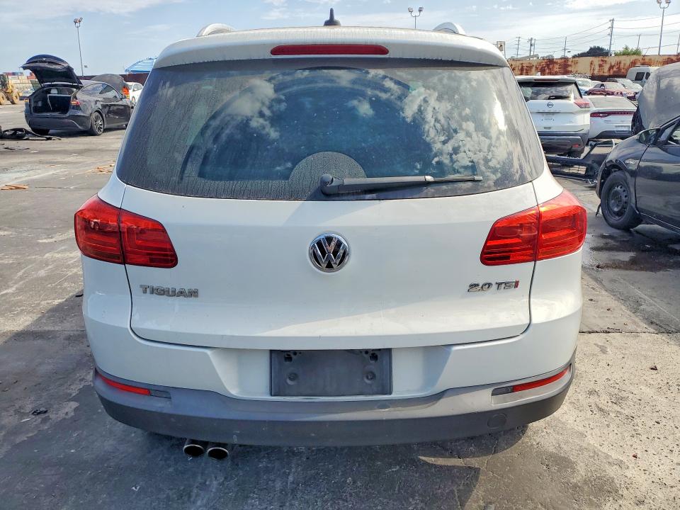 63688666 :رقم المزاد ، WVGAV3AX4EW560199 vin ، 2014 Volkswagen Tiguan مزاد بيع
