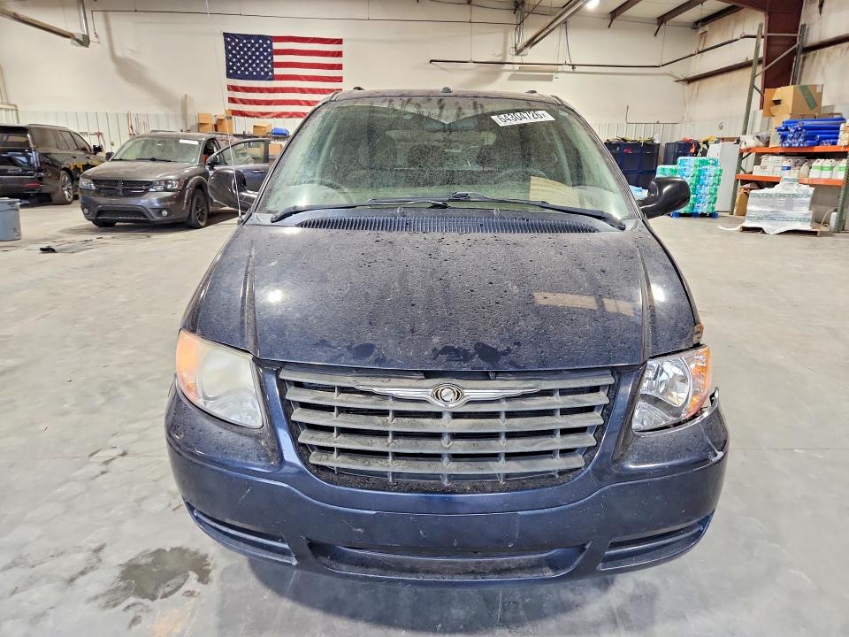 2007 Chrysler Town & Country მანქანა იყიდება აუქციონზე, vin: 1A4GJ45R57B248263, აუქციონის ნომერი: 64304726