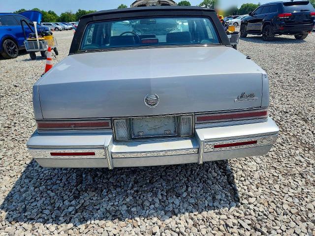 1990 Cadillac Seville მანქანა იყიდება აუქციონზე, vin: 1G6KS5333LU809255, აუქციონის ნომერი: 64501836