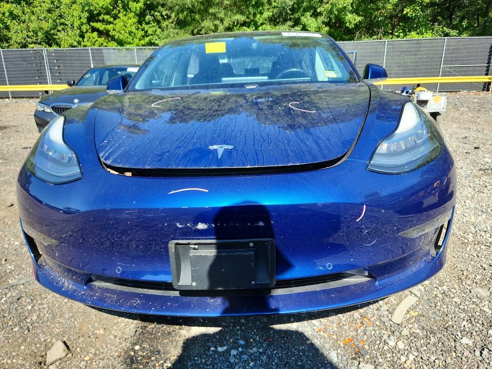 65724756 :رقم المزاد ، 5YJ3E1EA5JF033391 vin ، 2018 Tesla Model 3 مزاد بيع