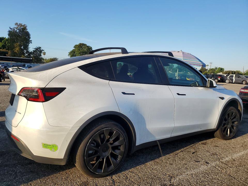 63853806 :رقم المزاد ، 7SAYGDEE9PF848774 vin ، 2023 Tesla Model Y مزاد بيع