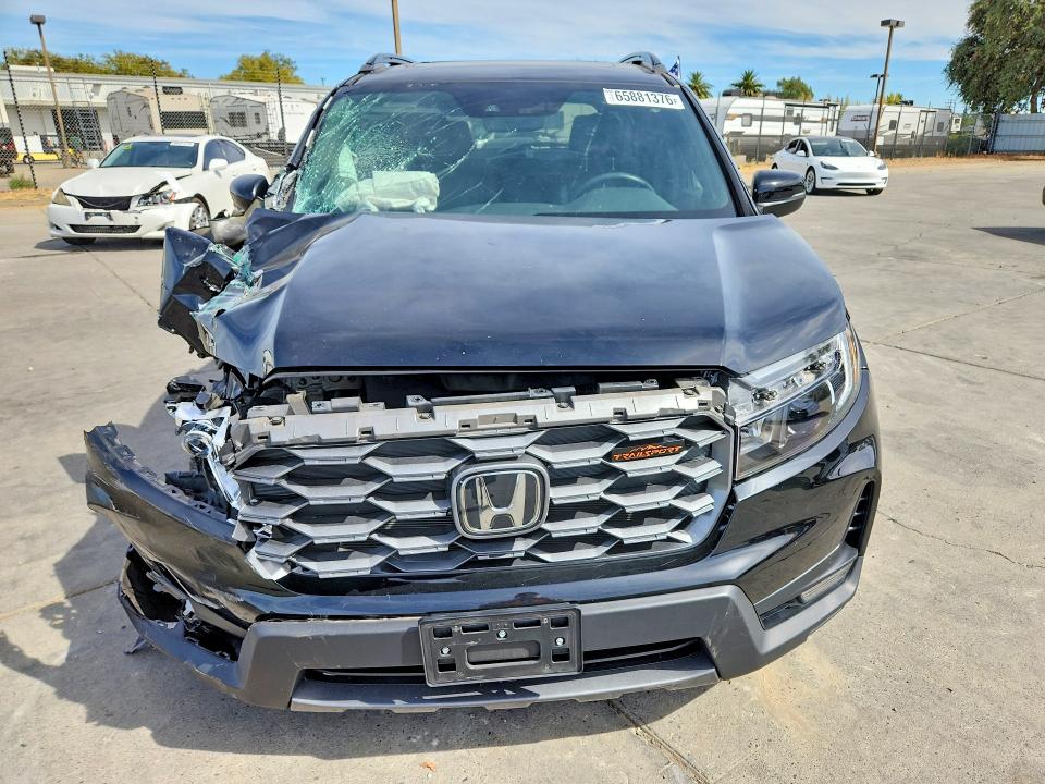 65881376 :رقم المزاد ، 5FNYF8H65PB016263 vin ، 2023 Honda Passport مزاد بيع