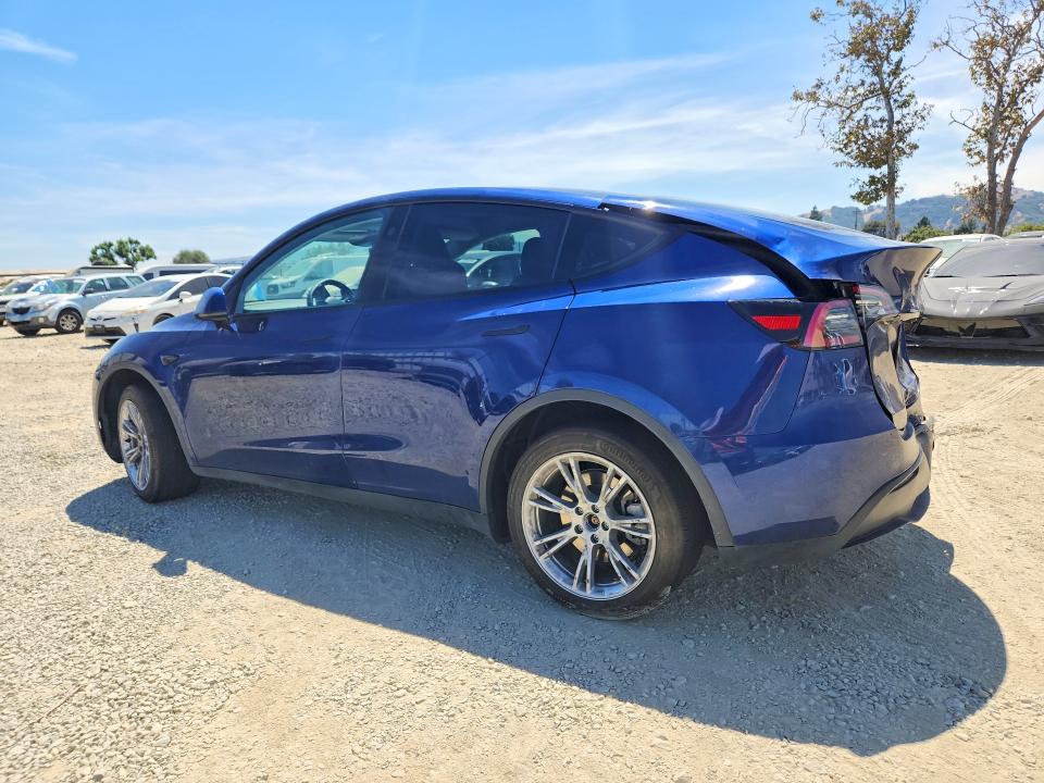 65761316 :رقم المزاد ، 7SAYGDED7PF976566 vin ، 2023 Tesla Model Y مزاد بيع