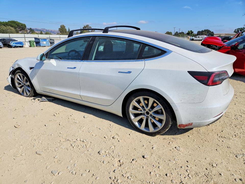 Продажа на аукционе авто 2018 Tesla Model 3, vin: 5YJ3E1EA0JF031256, номер лота: 65387636