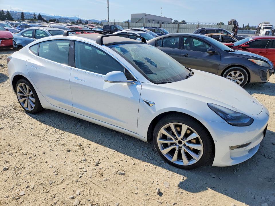 Продажа на аукционе авто 2018 Tesla Model 3, vin: 5YJ3E1EA0JF031256, номер лота: 65387636