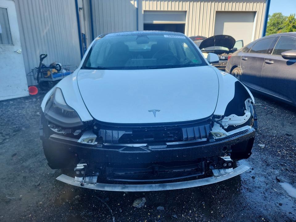 Продажа на аукционе авто 2022 Tesla Model 3, vin: 5YJ3E1EA2NF368971, номер лота: 65753986