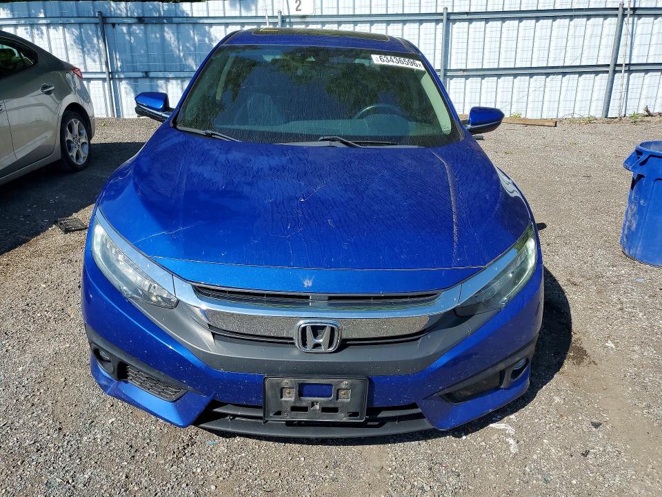 Auction sale of the 2018 Honda Civic, vin: 2HGFC1F92JH103819, lot number: 63436596