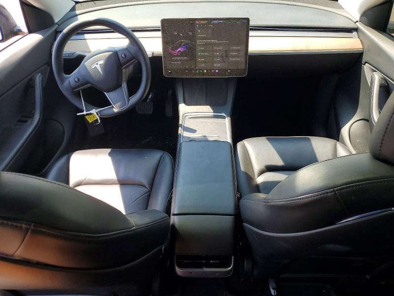 64058036 :رقم المزاد ، 5YJYGDEEXMF203821 vin ، 2021 Tesla Model Y مزاد بيع