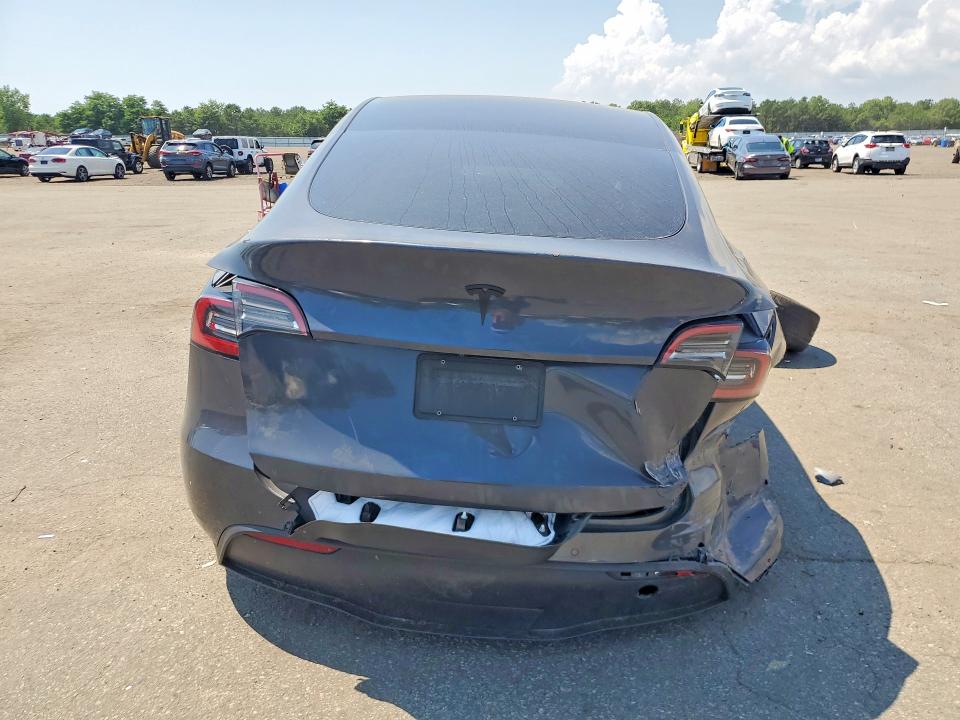 64058036 :رقم المزاد ، 5YJYGDEEXMF203821 vin ، 2021 Tesla Model Y مزاد بيع