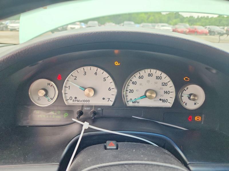 64935576 :رقم المزاد ، 1FAHP60A94Y100833 vin ، 2004 Ford Thunderbird مزاد بيع