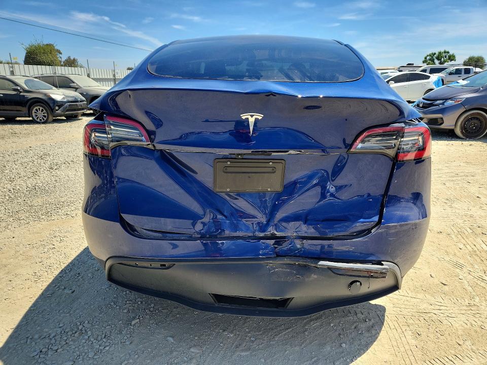 65761316 :رقم المزاد ، 7SAYGDED7PF976566 vin ، 2023 Tesla Model Y مزاد بيع