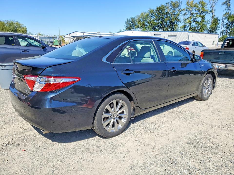 Auction sale of the 2016 Toyota Camry Hybrid, vin: 4T1BD1FK1GU186318, lot number: 64505676