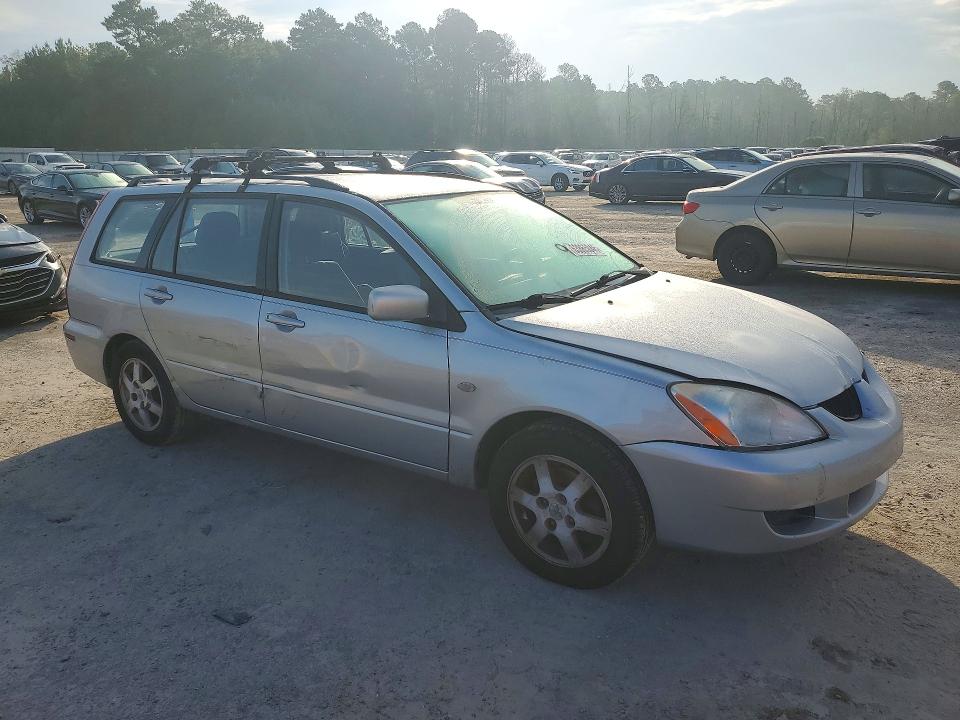 63865046 :رقم المزاد ، JA3AD29F84U010381 vin ، 2004 Mitsubishi Lancer مزاد بيع