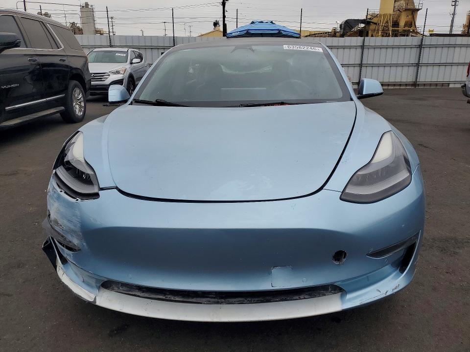 Продажа на аукционе авто 2021 Tesla Model 3, vin: 5YJ3E1EA6MF099114, номер лота: 63582246
