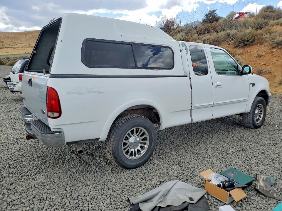 2000 Ford F150 მანქანა იყიდება აუქციონზე, vin: 1FTRX18L5YKA37049, აუქციონის ნომერი: 65183986