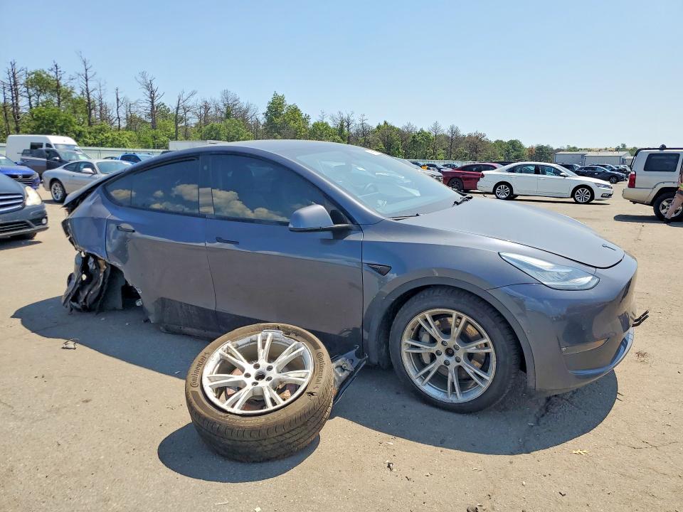 64058036 :رقم المزاد ، 5YJYGDEEXMF203821 vin ، 2021 Tesla Model Y مزاد بيع