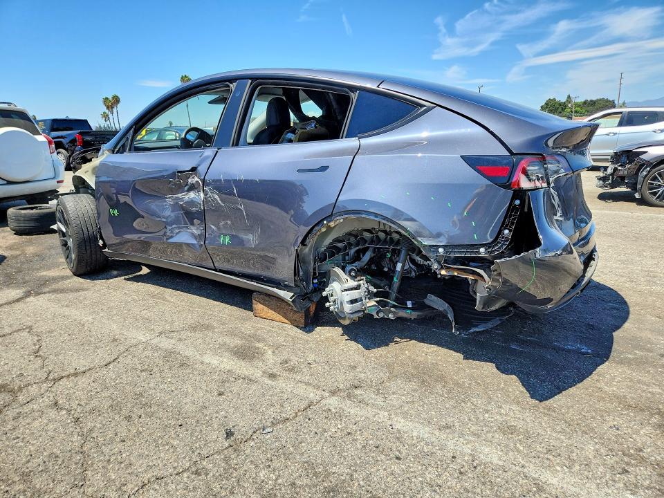 65501976 :رقم المزاد ، 5YJYGDEE0MF149025 vin ، 2021 Tesla Model Y مزاد بيع