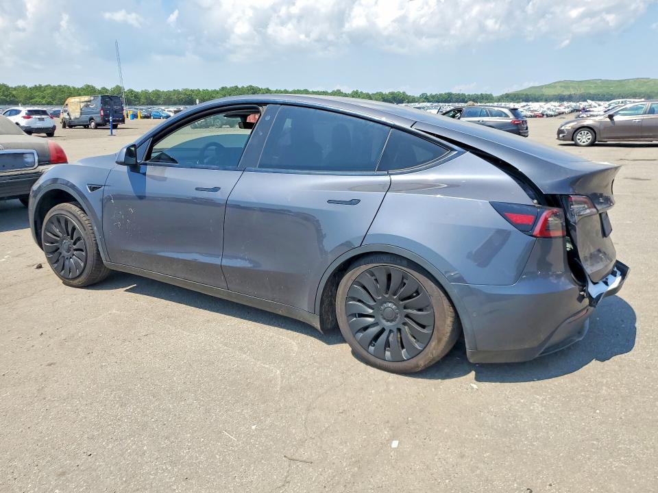 64058036 :رقم المزاد ، 5YJYGDEEXMF203821 vin ، 2021 Tesla Model Y مزاد بيع