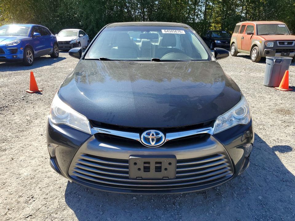 Auction sale of the 2016 Toyota Camry Hybrid, vin: 4T1BD1FK1GU186318, lot number: 64505676