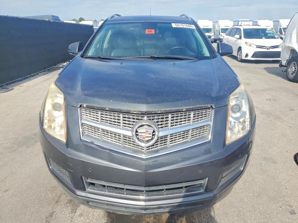 Продажа на аукционе авто 2010 Cadillac Srx, vin: 3GYFNAEY5AS587249, номер лота: 66191686