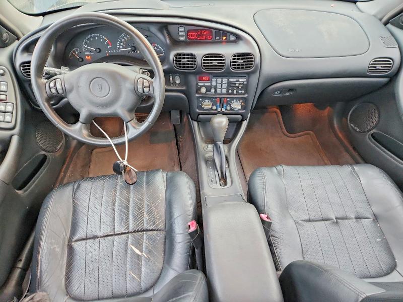 2002 Pontiac Grand Prix მანქანა იყიდება აუქციონზე, vin: 1G2WP52K32F117772, აუქციონის ნომერი: 63872896