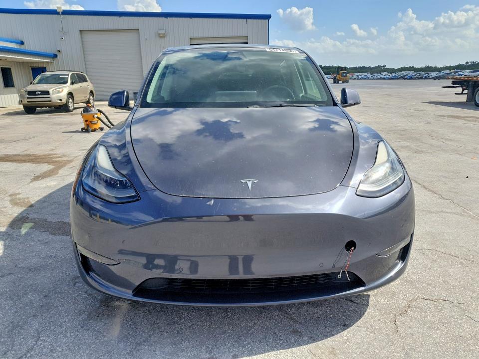 64714666 :رقم المزاد ، 5YJYGDEF9MF261704 vin ، 2021 Tesla Model Y مزاد بيع