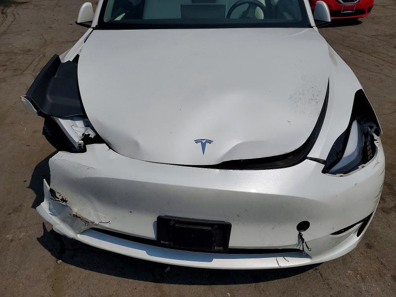 Auction sale of the 2025 Tesla Model Y, vin: 7SAYGAEE7SF288311, lot number: 64292576