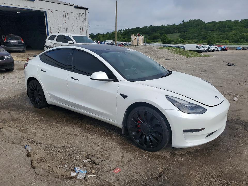 Продажа на аукционе авто 2023 Tesla Model 3, vin: 5YJ3E1EC2PF410530, номер лота: 63875126