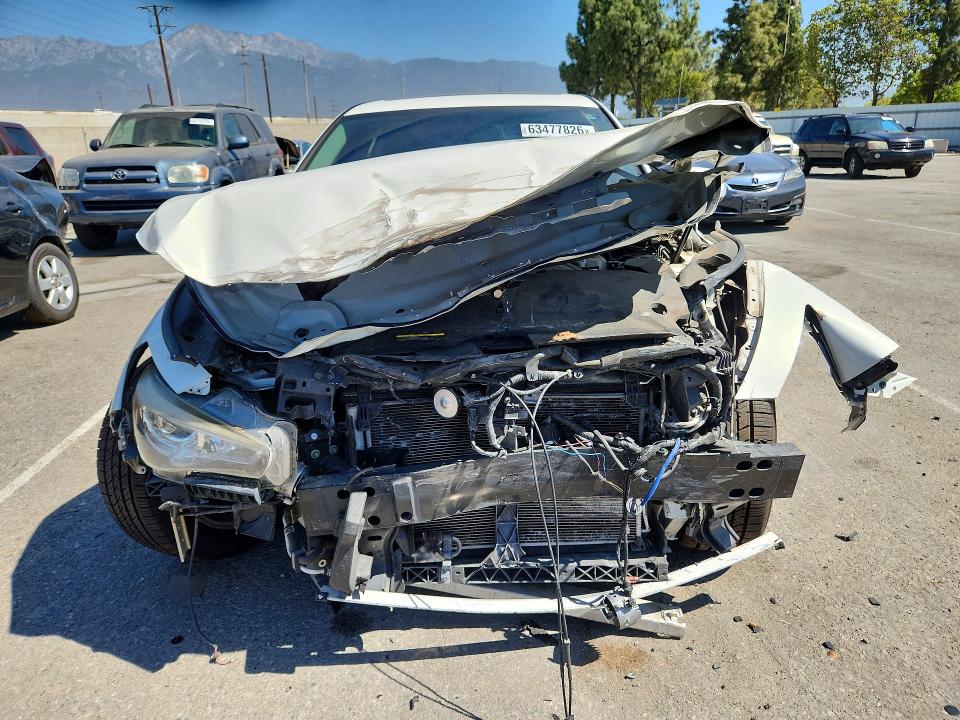 63477826 :رقم المزاد ، JN1BV7AP5FM338514 vin ، 2015 Infiniti Q50 مزاد بيع