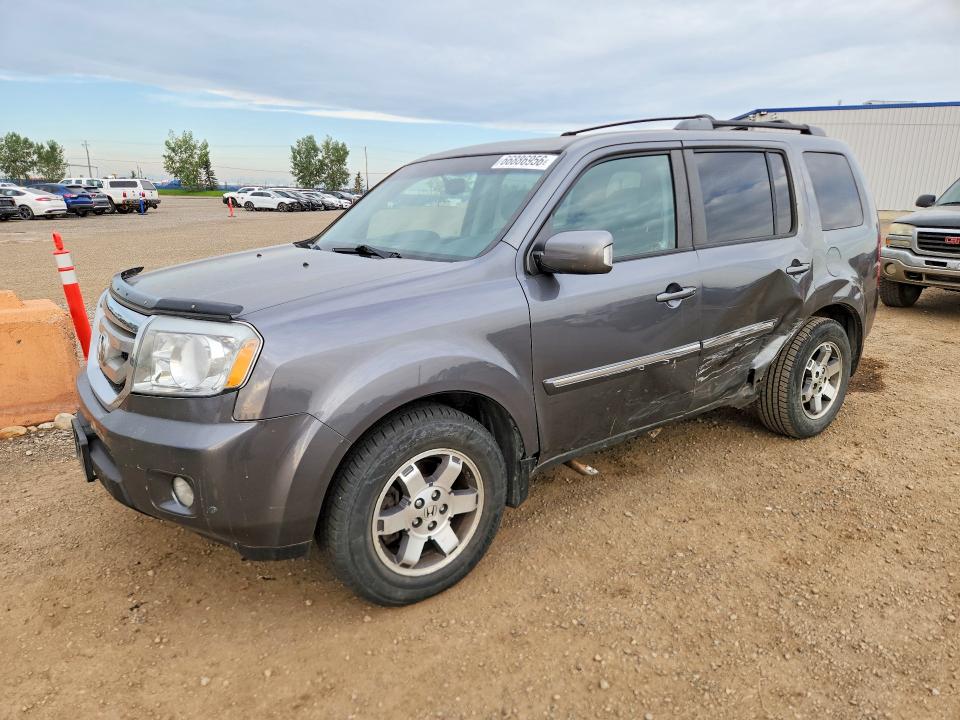 66886956 :رقم المزاد ، 5FNYF4H99BB504272 vin ، 2011 Honda Pilot مزاد بيع