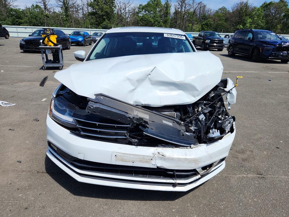 Продажа на аукционе авто 2018 Volkswagen Jetta, vin: 3VWL17AJ2JM207303, номер лота: 63647356