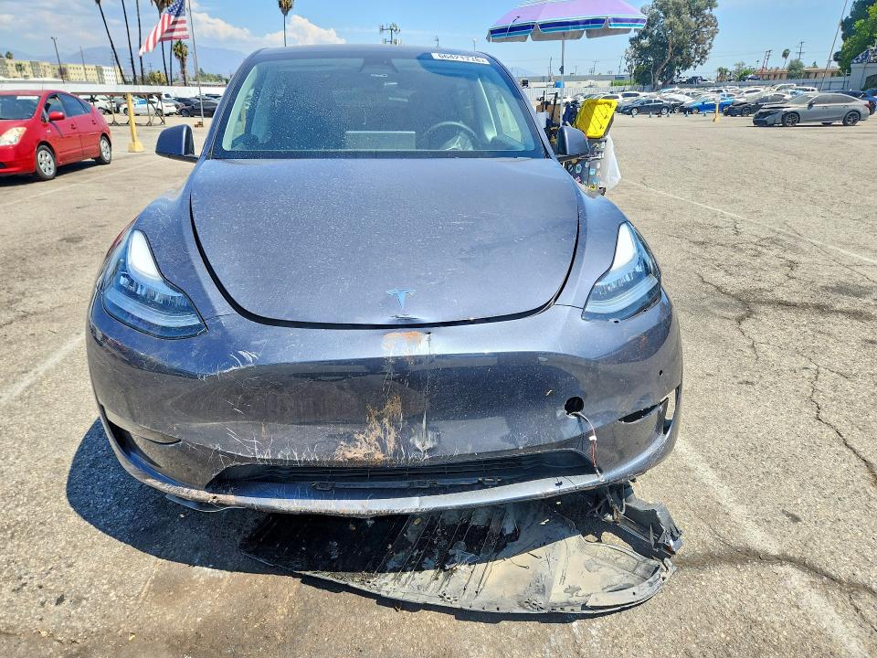 2022 Tesla Model Y მანქანა იყიდება აუქციონზე, vin: 7SAYGDEE7NF512148, აუქციონის ნომერი: 66421776