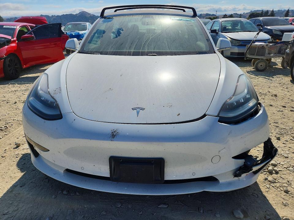 Продажа на аукционе авто 2018 Tesla Model 3, vin: 5YJ3E1EA0JF031256, номер лота: 65387636