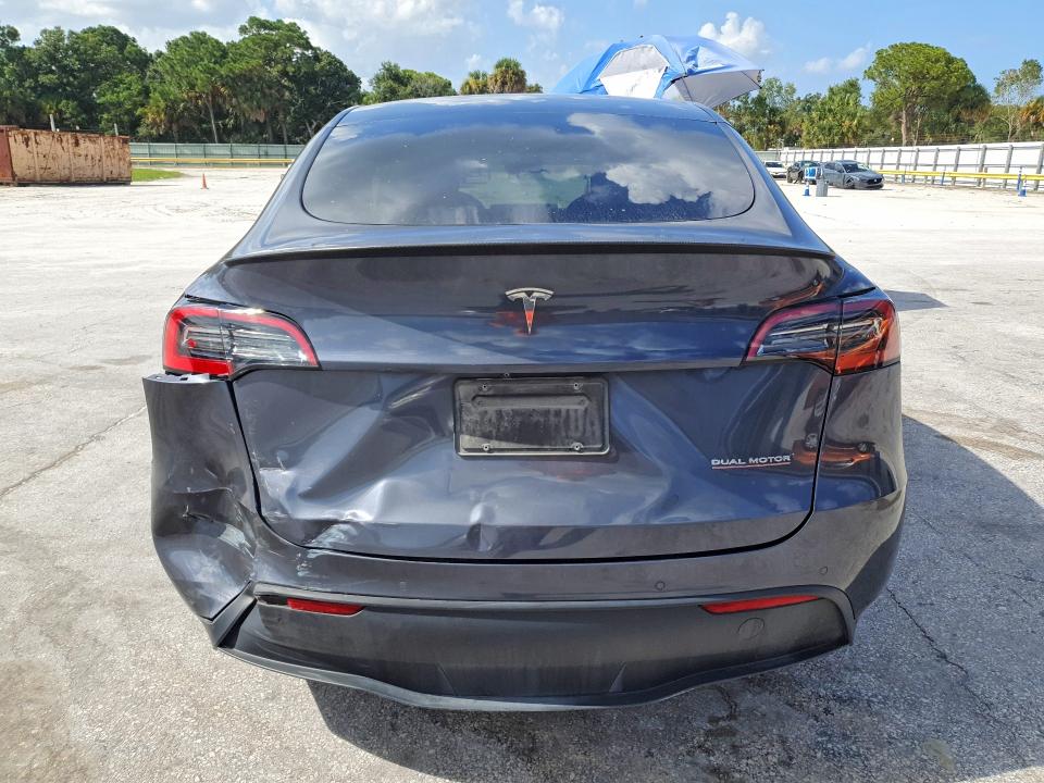64714666 :رقم المزاد ، 5YJYGDEF9MF261704 vin ، 2021 Tesla Model Y مزاد بيع