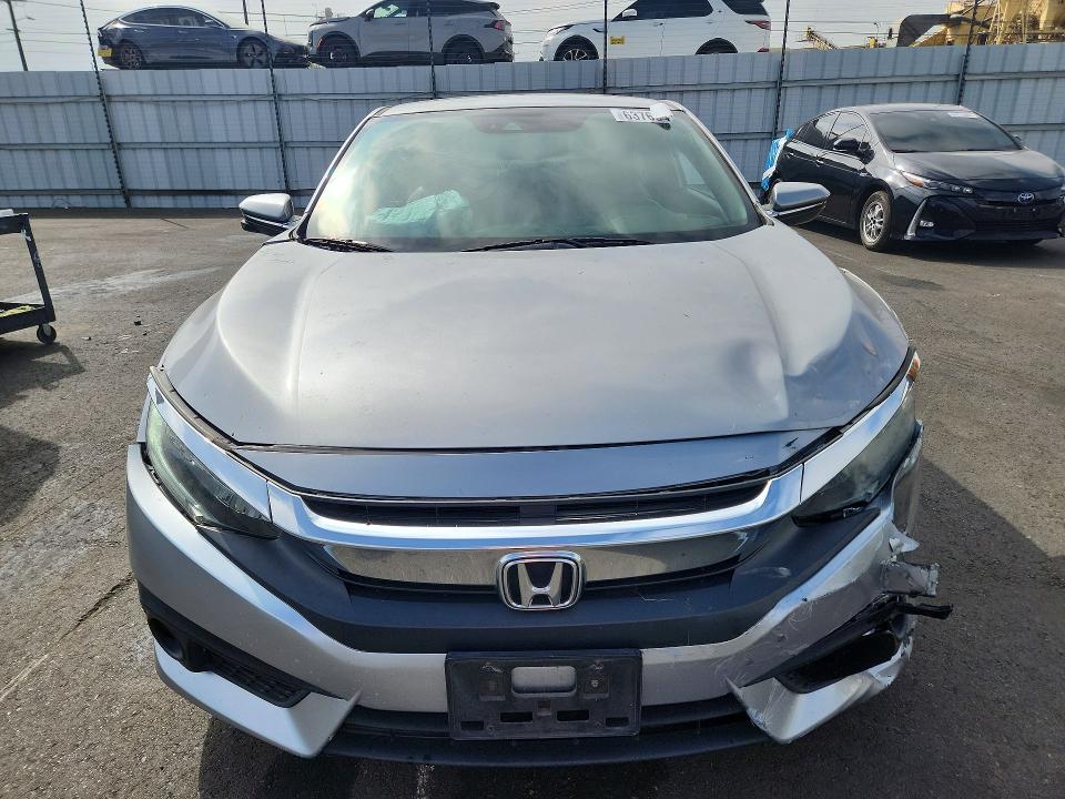 Продажа на аукционе авто 2018 Honda Civic, vin: 2HGFC3B97JH354868, номер лота: 63769486